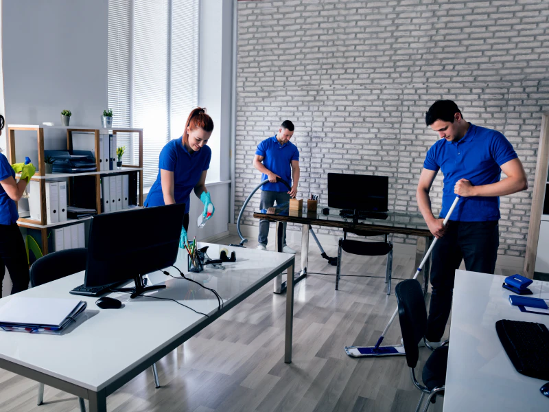 cleaning contractors cleaning an offices desks and floor sewell nj