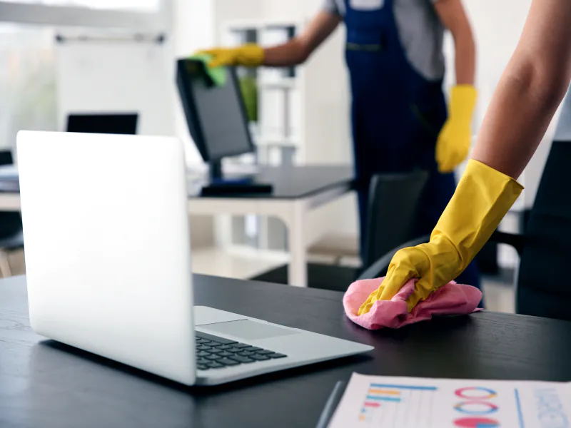 cleaning contractors cleaning desks during office cleaning service sewell nj